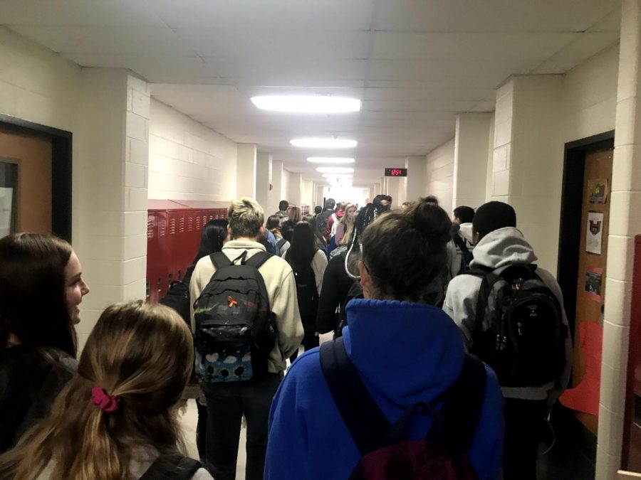 Students walking to class after their lunch block.