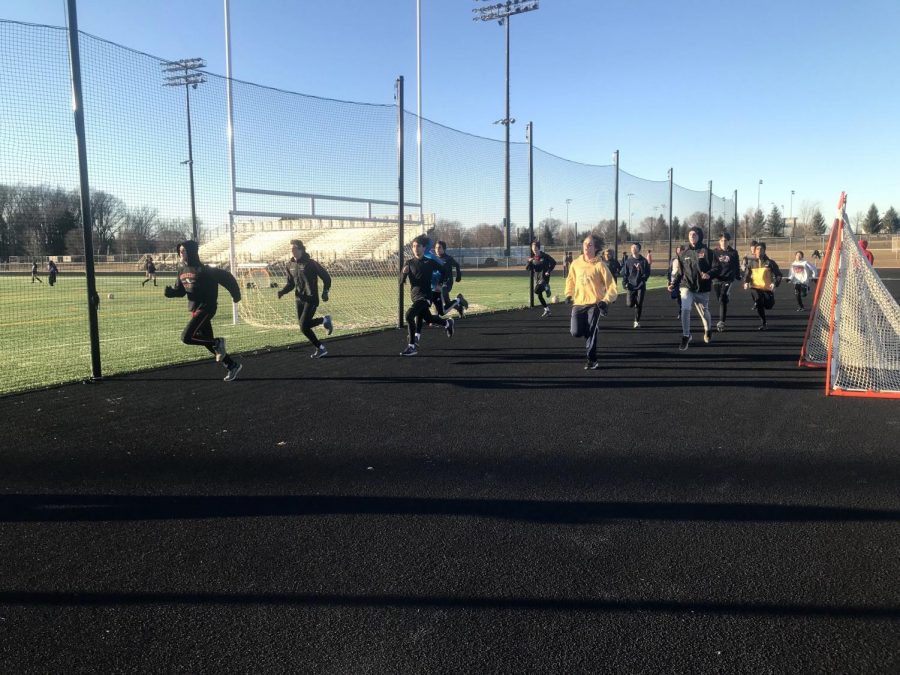 The 2018-19 distance track team getting ready for the first training of the season.