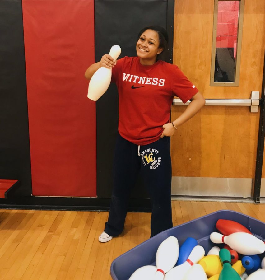 Jasmine Davis, sophomore, smiles after playing games in PE.