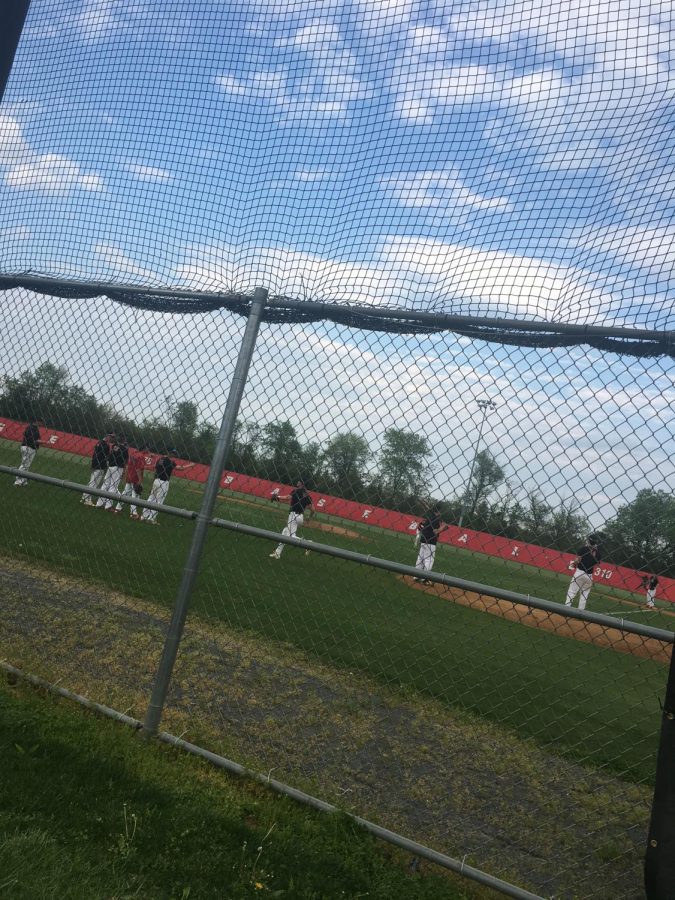 Heritage Baseball team warming up for their game.