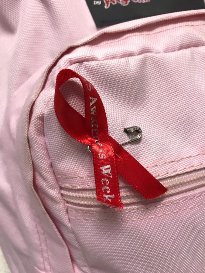 The Awareness Ribbon on a students backpack.