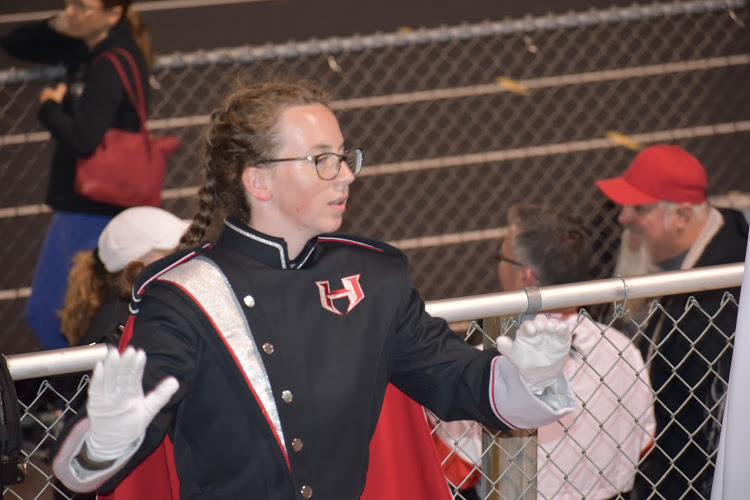 Libby is drum major for the Heritage High School Marching Band. You can find her waving her arms (also known as conducting) at every football game and competition. 