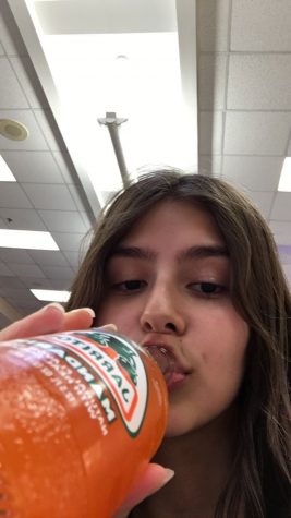 She rarely drink soda but when she does, she get addicted to Mexican orange soda.