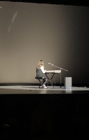 Reese played piano and sang at this years school talent show.