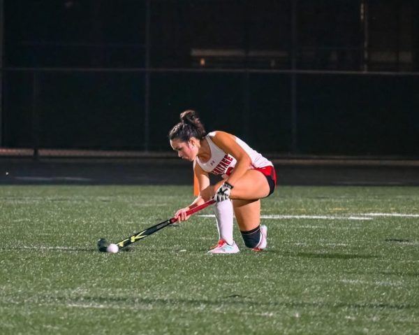 Addison Phomsopha Playing Field Hockey